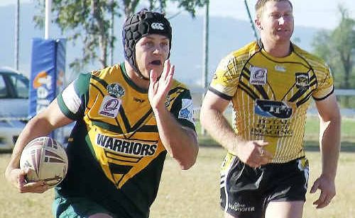 Wattles centre Matt McCarthy is try bound leaving Gatton Hawks winger Chris Dodt behind on Sunday in the Warriors 70-10 Round 10 loss at Clifton’s Platz Oval. Wattles centre Matt McCarthy is try bound leaving Gatton Hawks winger Chris Dodt behind on Sunday in the Warriors 70-10 Round 10 loss at Clifton’s Platz Oval.